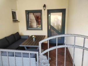 a living room with a couch and a table at Apartment Keti in Čižići