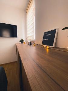TV tai viihdekeskus majoituspaikassa Elena Apartman