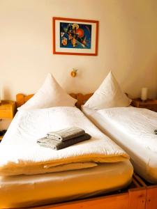Posteľ alebo postele v izbe v ubytovaní Haus Hibiskus
