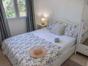 Кровать или кровати в номере Pebble Bay Paradise House