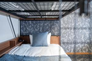 Uma cama ou camas num quarto em MP STYLE Fortuna