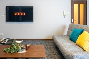 Uma televisão e/ou sistema de entretenimento em MP STYLE Fortuna