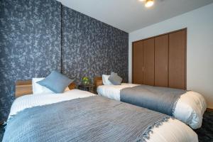 Uma cama ou camas num quarto em MP STYLE Fortuna