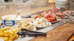 Comida no apart-hotel ou em algum lugar perto