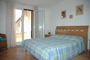 A bed or beds in a room at Regina