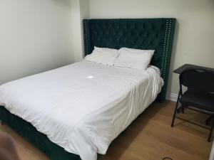 Postel nebo postele na pokoji v ubytování RAESABU GUEST HOUSE
