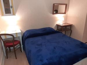 Postel nebo postele na pokoji v ubytování La Coutrotte Becquine