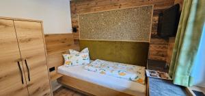 Letto o letti in una camera di Hotel-Garni Pramstraller