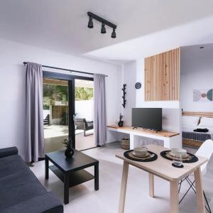 TV a/nebo společenská místnost v ubytování Utopia Luxury Apartment