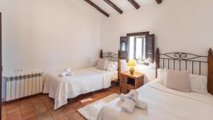Posteľ alebo postele v izbe v ubytovaní Finca las Chozas Antequera - La Joya by Ruralidays