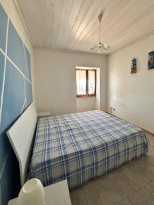 Postel nebo postele na pokoji v ubytování La Casa Di Giò + 12 fotografií