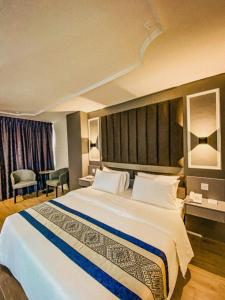 Легло или легла в стая в Muar Traders Hotel
