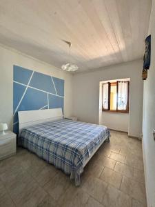 Postel nebo postele na pokoji v ubytování La Casa Di Giò