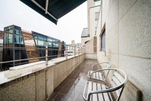 En balkon eller terrasse på Bundang Regency Hotel