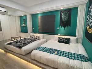 Ein Bett oder Betten in einem Zimmer der Unterkunft 鹿莫思 Lumos
