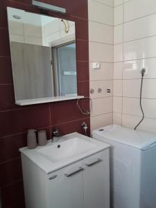 Kúpeľňa v ubytovaní Apartmani Zoran + 37 fotografií