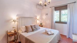 Posteľ alebo postele v izbe v ubytovaní Villa Gema Antequera - La Joya by Ruralidays
