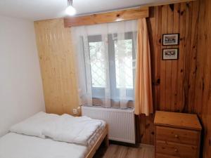 Postel nebo postele na pokoji v ubytování Chata Studnička