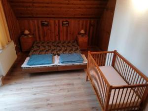 Postel nebo postele na pokoji v ubytování Chata Studnička
