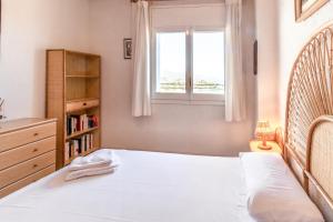 Llit o llits en una habitació de Fener de Dalt 842 Apartamento con terraza