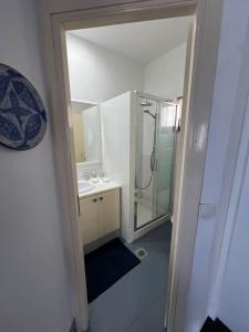 a bathroom with a shower and a sink at La casa sulle rocce House on the rocks in Asos +75 photos