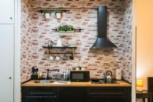 A kitchen or kitchenette at St. Peter Sweets