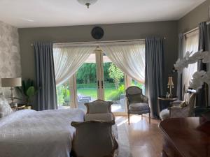 Postel nebo postele na pokoji v ubytování Ballybur Lodge