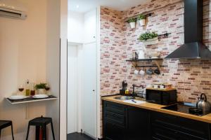 A kitchen or kitchenette at St. Peter Sweets