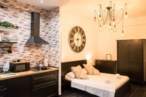 A bed or beds in a room at St. Peter Sweets