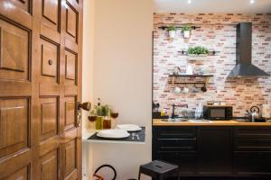 A kitchen or kitchenette at St. Peter Sweets
