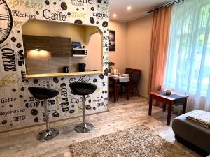 Posezení v ubytování Apartament Karkonoska 19 Karpacz by Przycup w Karkonoszach Apartamenty Karpacz Centrum Karkonosze