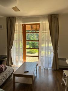 Postel nebo postele na pokoji v ubytování Apartmán Vratička Říčky v Orlických horách