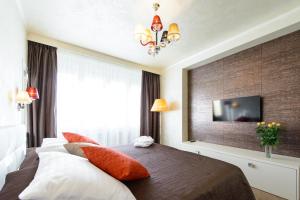 Posteľ alebo postele v izbe v ubytovaní Myo Hotel Mysterius