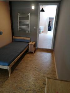 Ένα ή περισσότερα κρεβάτια σε δωμάτιο στο Stilvolles Loft mit viel Platz