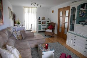 a living room with a couch and a table at Casa San Martiño - Teo in Rua De Francos +20 photos