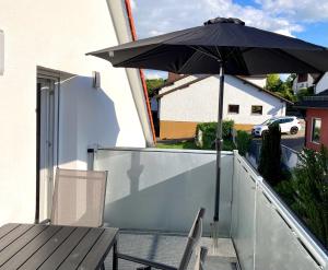 Patio nebo venkovní prostory v ubytování Moderne DG-Wohnung im Günztal