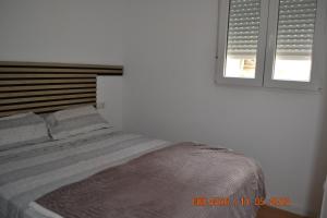 Posteľ alebo postele v izbe v ubytovaní Cosy Sunrise Beach