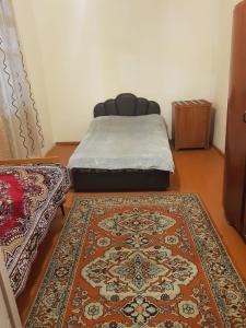 Postel nebo postele na pokoji v ubytování IDEA Guest House / ИДЕА гостевой дом