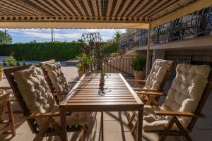 Balkón nebo terasa v ubytování Storge Boutique Bed & Breakfast