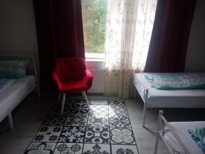 Postel nebo postele na pokoji v ubytování Direkt am See Ferienwohnungen