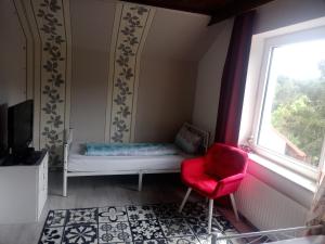 Postel nebo postele na pokoji v ubytování Direkt am See Ferienwohnungen