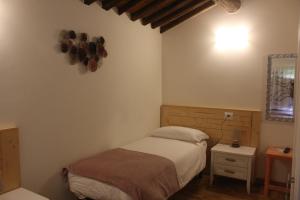 Posteľ alebo postele v izbe v ubytovaní B&B Podere Lambure- società agricola