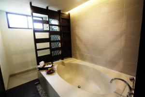 Koupelna v ubytování Khaolak Orchid Beach Resort - SHA Extra Plus