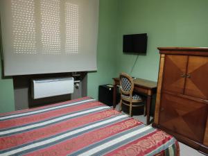TV a/nebo společenská místnost v ubytování Hotel Plaza