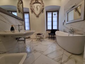 a large bathroom with a tub and a sink at 1Dest - Living The Dream in Arco +61 photos