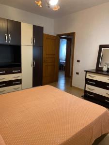 Giường trong phòng chung tại Casa vacanze vicino al mare!