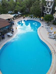 Bazén v ubytování LEMAS SUITE HOTEL nebo v jeho okolí