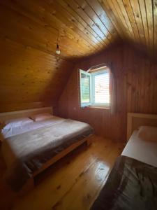 Krevet ili kreveti u jedinici u okviru objekta Guest House Dzajovic