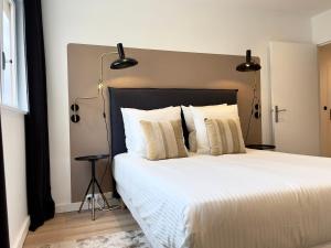 Ліжко або ліжка в номері GuestReady - A family home in Charenton-le-Pont