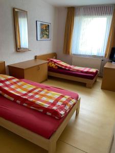 Postel nebo postele na pokoji v ubytování Easyrooms